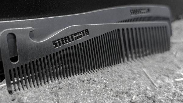 Two combs. One has fine teeth and wide teeth and a bottle opener. The other one has a handle and long thick teeth.