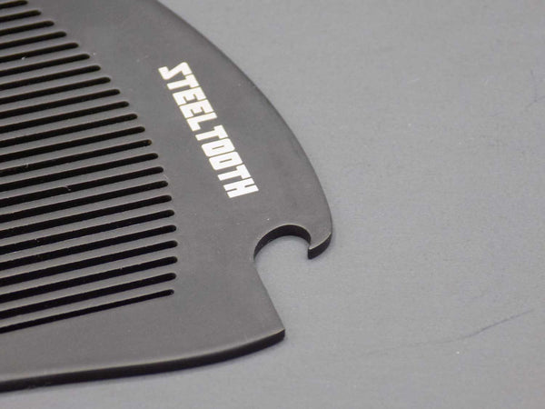 the bottle opener part on the Steeltooth pocket comb. 