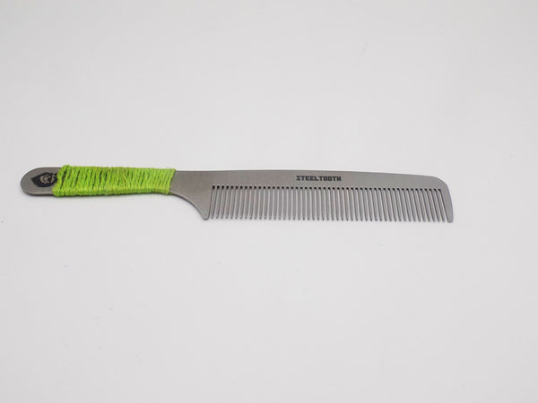 A Steeltooth comb with a green handle to provide extra grip