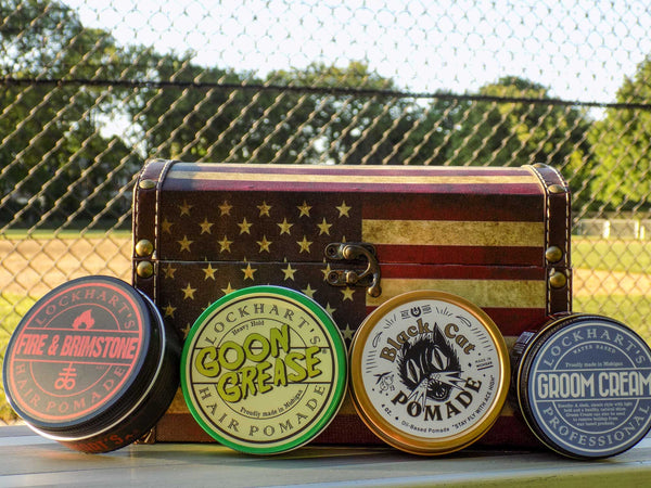 A gift set with Fire and brimstone, Goon Grease, Black Cat pomade, and lockhart's groom Cream. 